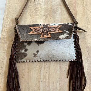 Cowhide tooled leather bag